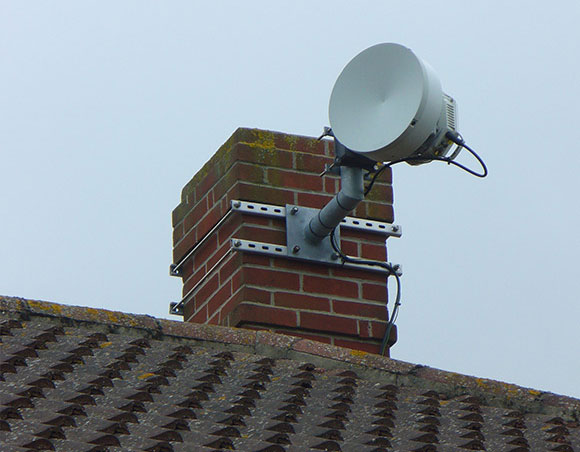 Microwave wifi dish mounted on a domestic chimney